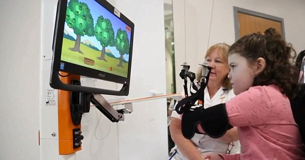 After A Brain Hemorrhage Leaves The Left Side Of Her Body Paralyzed, She Uses Video Games To Learn To Move Again