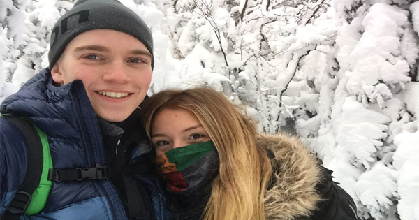 A College Couple Goes On A Hike And Gets Stuck In A Blizzard. He Zips His Backpack Around Her Legs To Keep Her Warm And Manages To Save His Mom