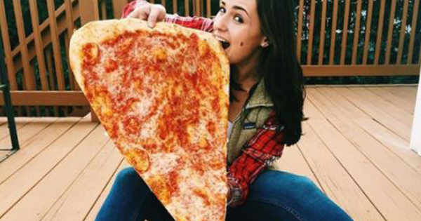 Do Americans Really Have The Biggest Portion Sizes In The World? This Pizza Place Is Testing The Limit With Their Massive Slices!